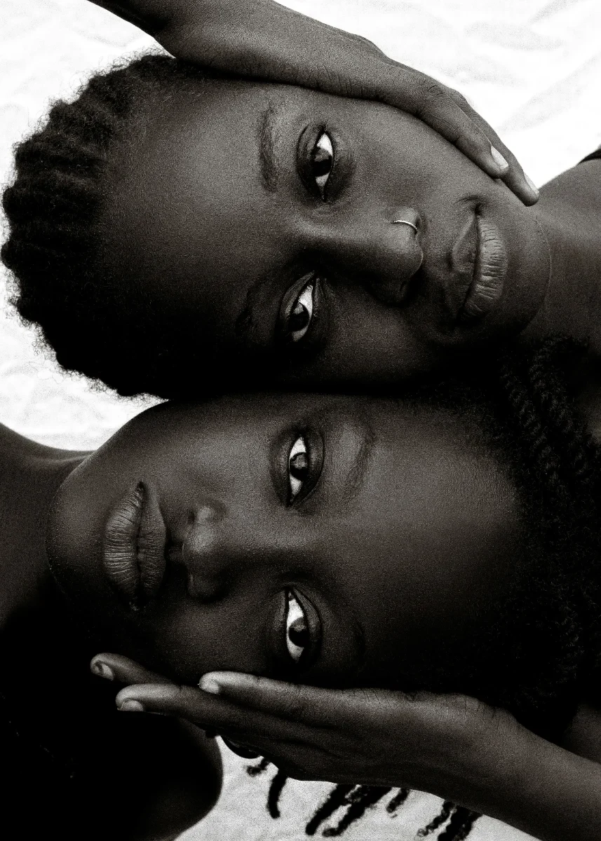 Two faces resting together